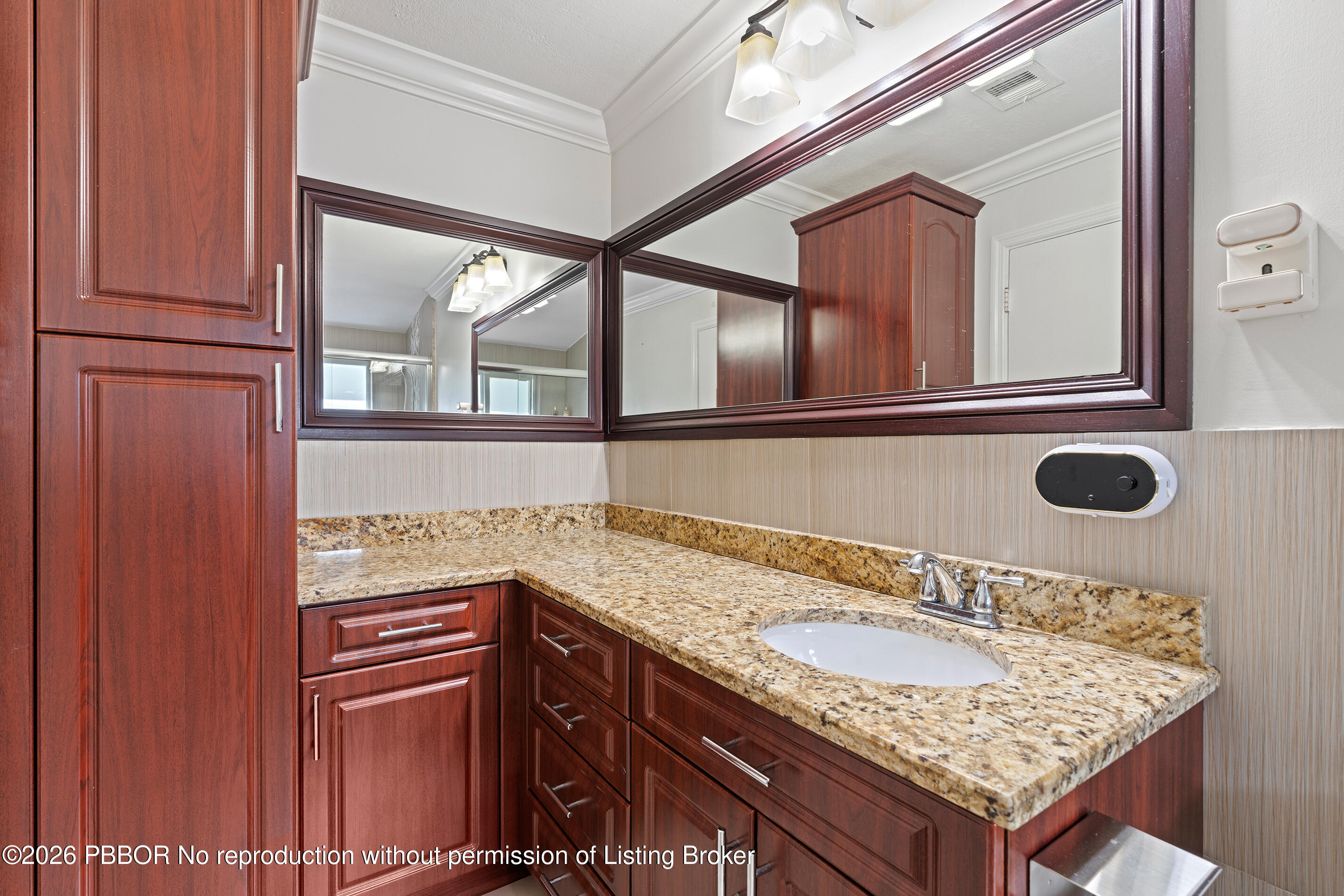 747 Avon Road West Palm Beach, FL 33401 - Photo 13 of 29 a bathroom with a granite countertop sink and a mirror