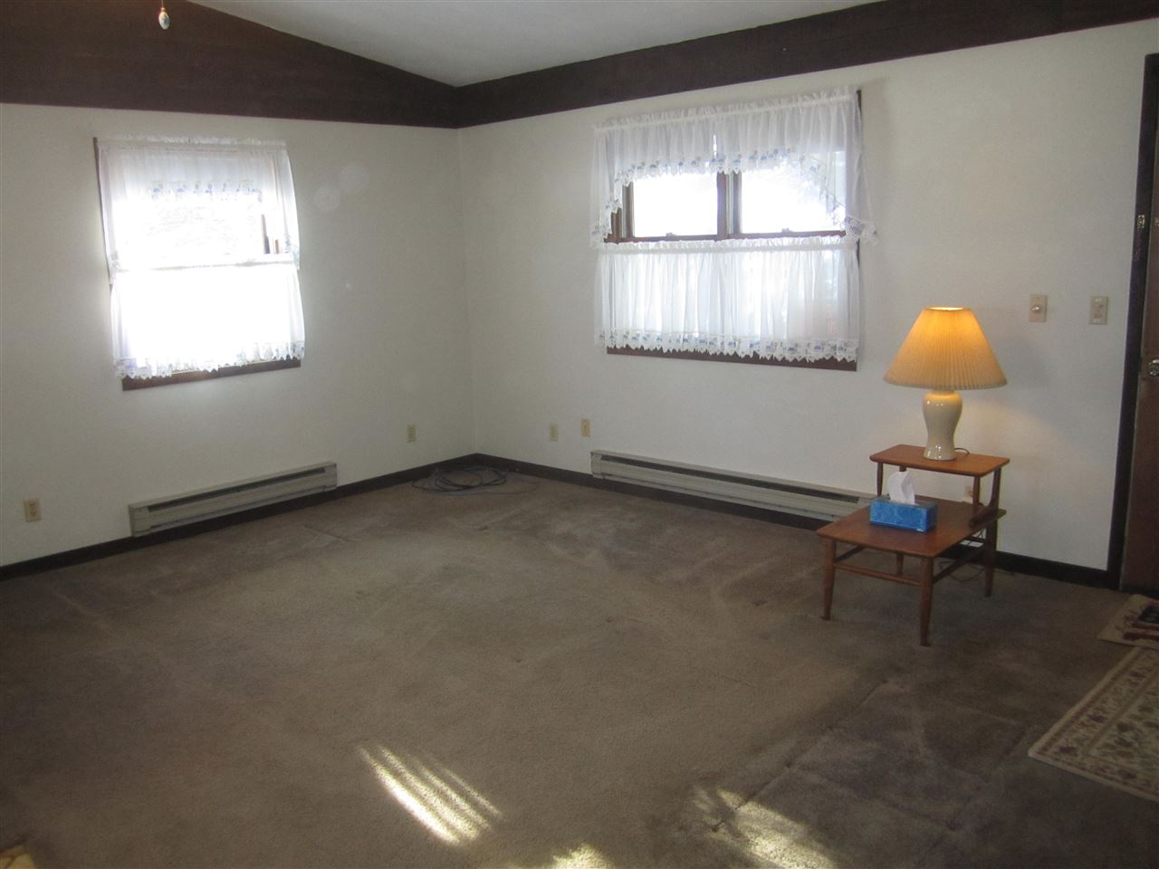 3767 Spring Center Road Garden Prairie, IL 61038 - Photo 5 of 17 a living room with furniture and a window