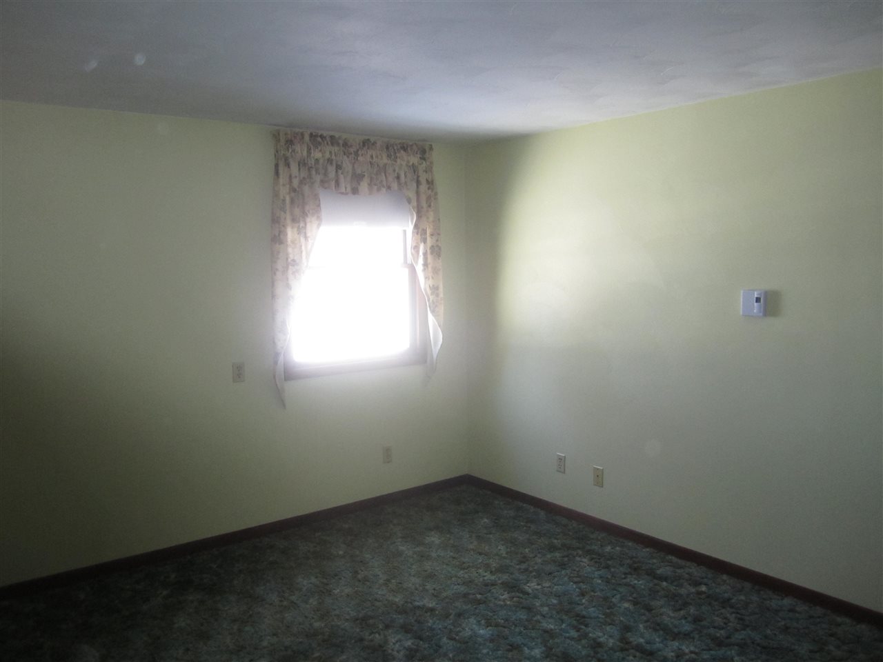3767 Spring Center Road Garden Prairie, IL 61038 - Photo 9 of 17 an empty room with a window