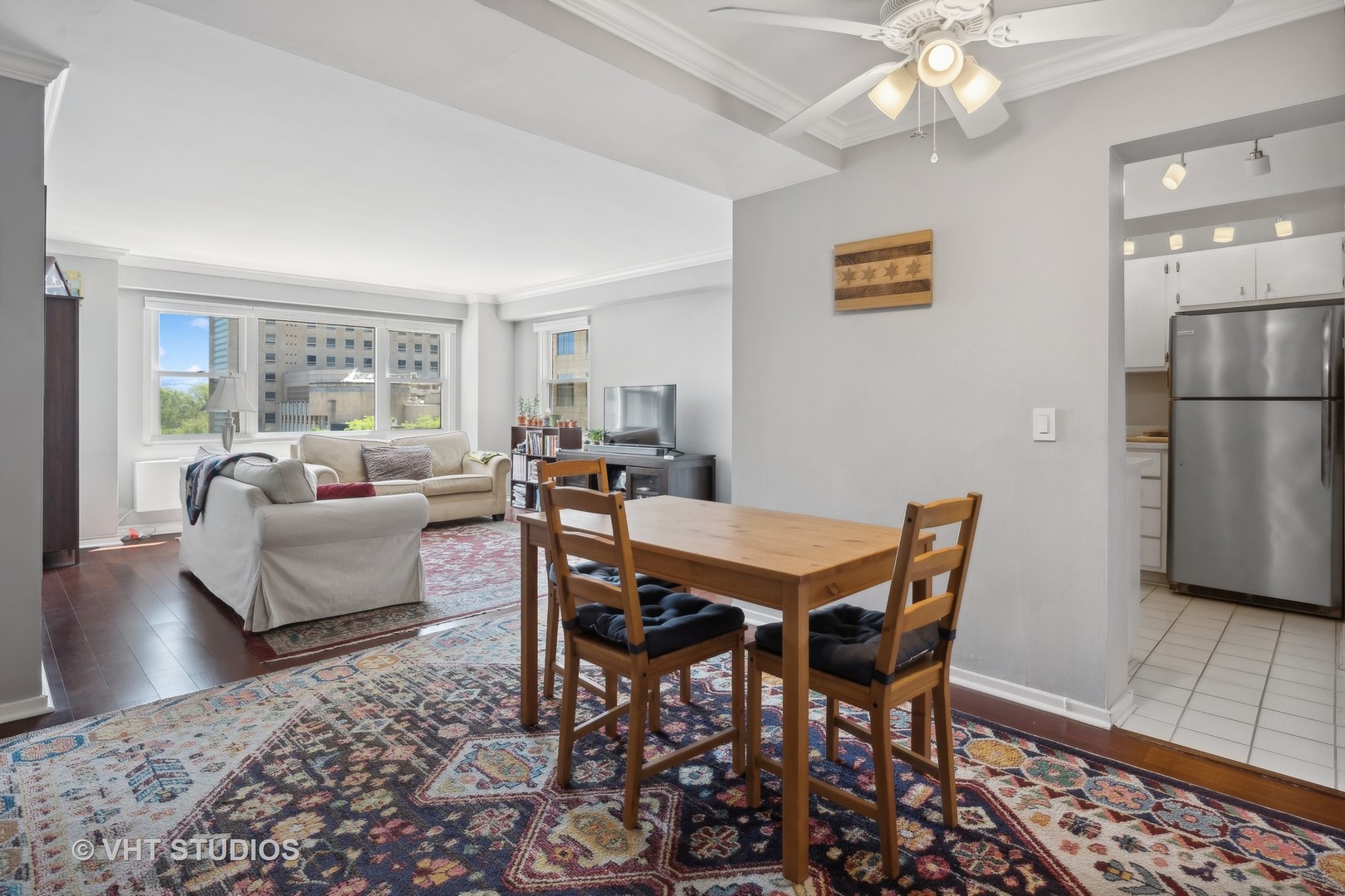 2909 North Sheridan Road, Unit 609 Chicago, IL 60657 - Photo 4 of 11 a view of a dining room with furniture