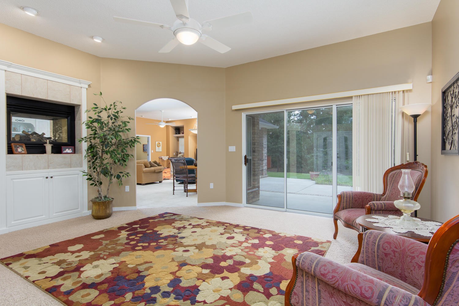 2573 Cove Road Navarre, FL 32566 - Photo 3 of 28 a living room with furniture and a large window
