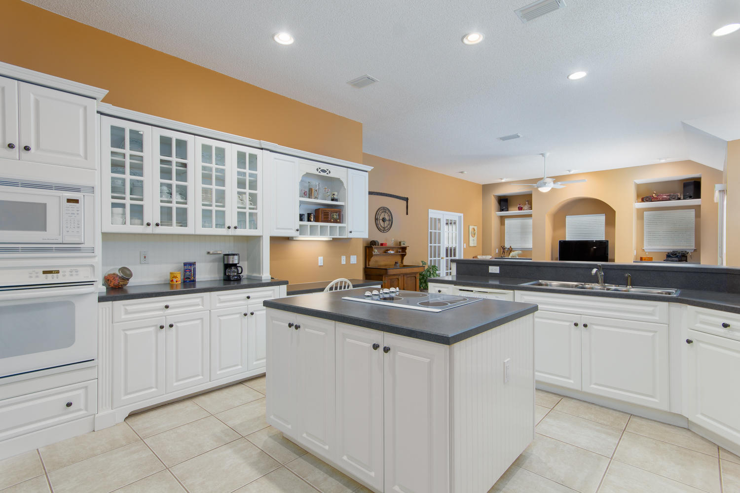 2573 Cove Road Navarre, FL 32566 - Photo 4 of 28 a kitchen with sink and cabinets