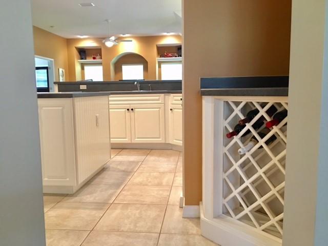 2573 Cove Road Navarre, FL 32566 - Photo 6 of 28 a bathroom with a sink and a mirror