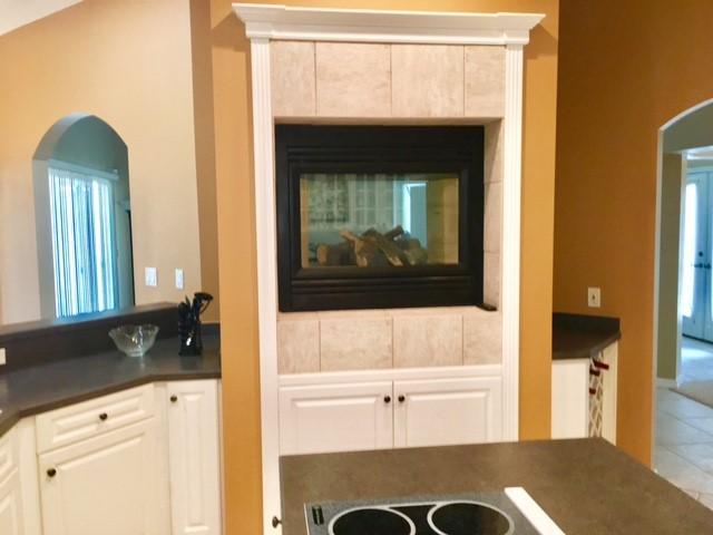 2573 Cove Road Navarre, FL 32566 - Photo 7 of 28 a bathroom with a sink and a mirror
