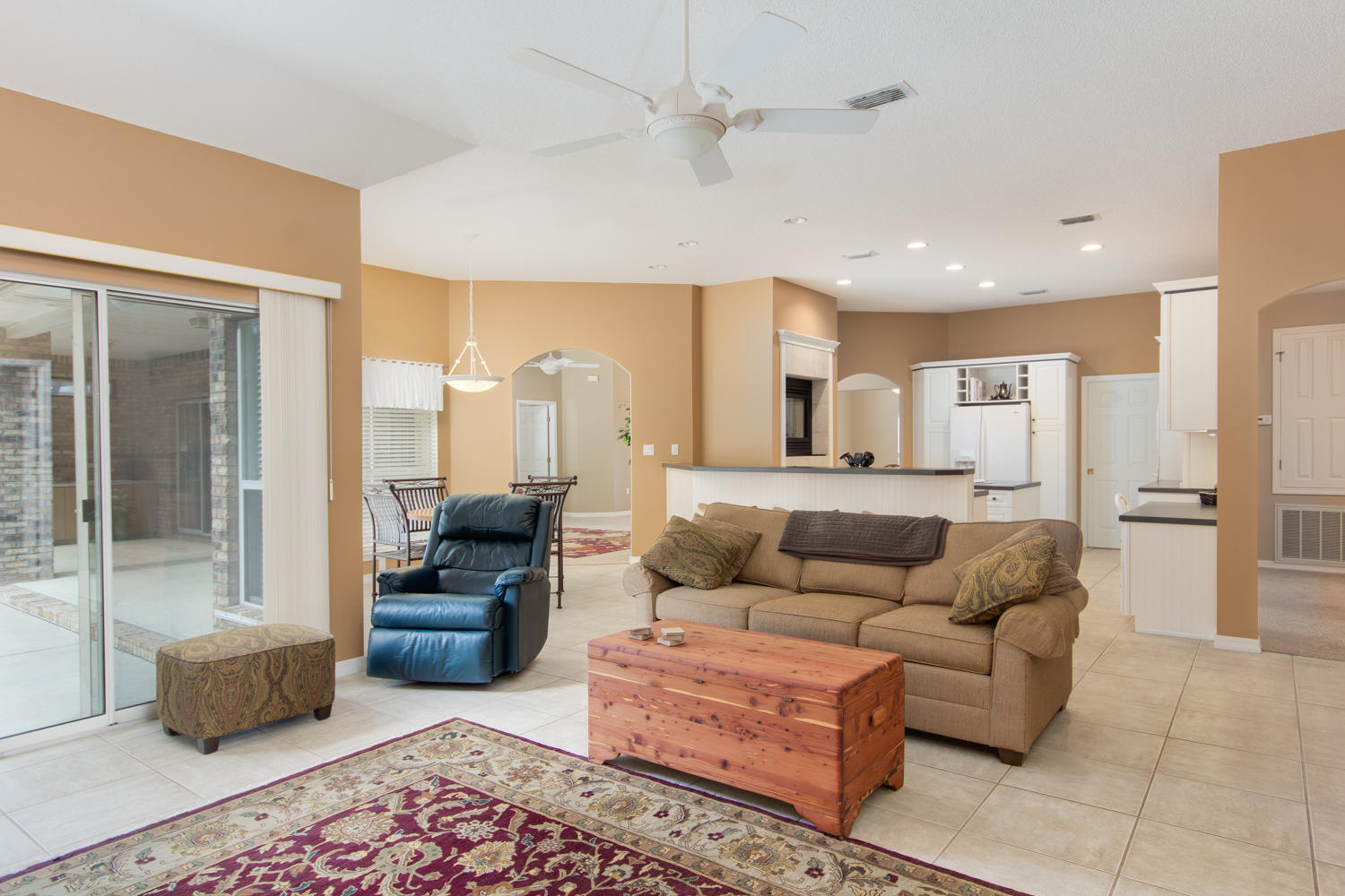2573 Cove Road Navarre, FL 32566 - Photo 10 of 28 a living room with furniture and a rug
