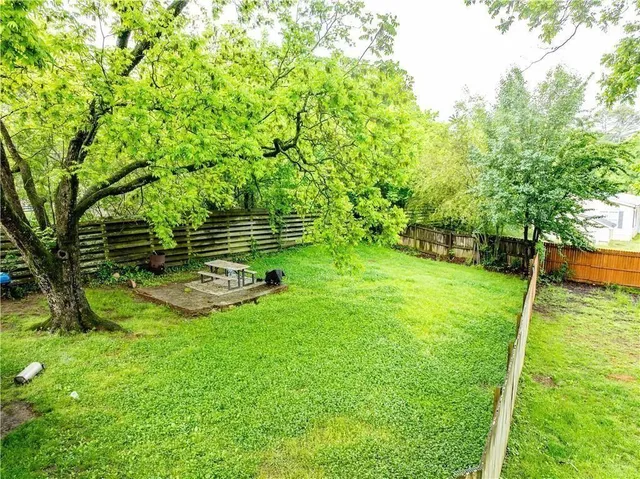 a view of a backyard with a small park