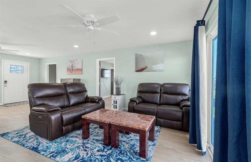 1019 Treaty Drive Surfside Beach, TX 77541 - Photo 11 of 43 a living room with furniture and a rug