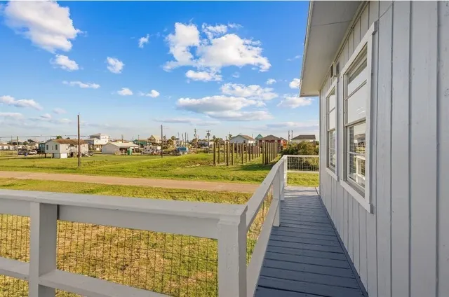 a view of swimming pool with seating space