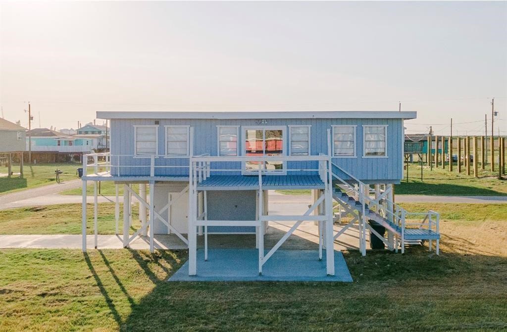 1019 Treaty Drive Surfside Beach, TX 77541 - Photo 32 of 43 a view of a house with a swimming pool
