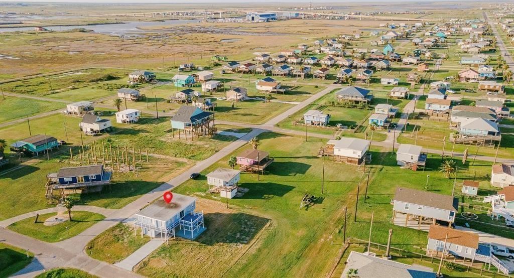 1019 Treaty Drive Surfside Beach, TX 77541 - Photo 38 of 43 an aerial view of residential houses with outdoor space