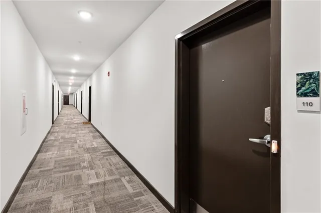 a view of hallway with stairs