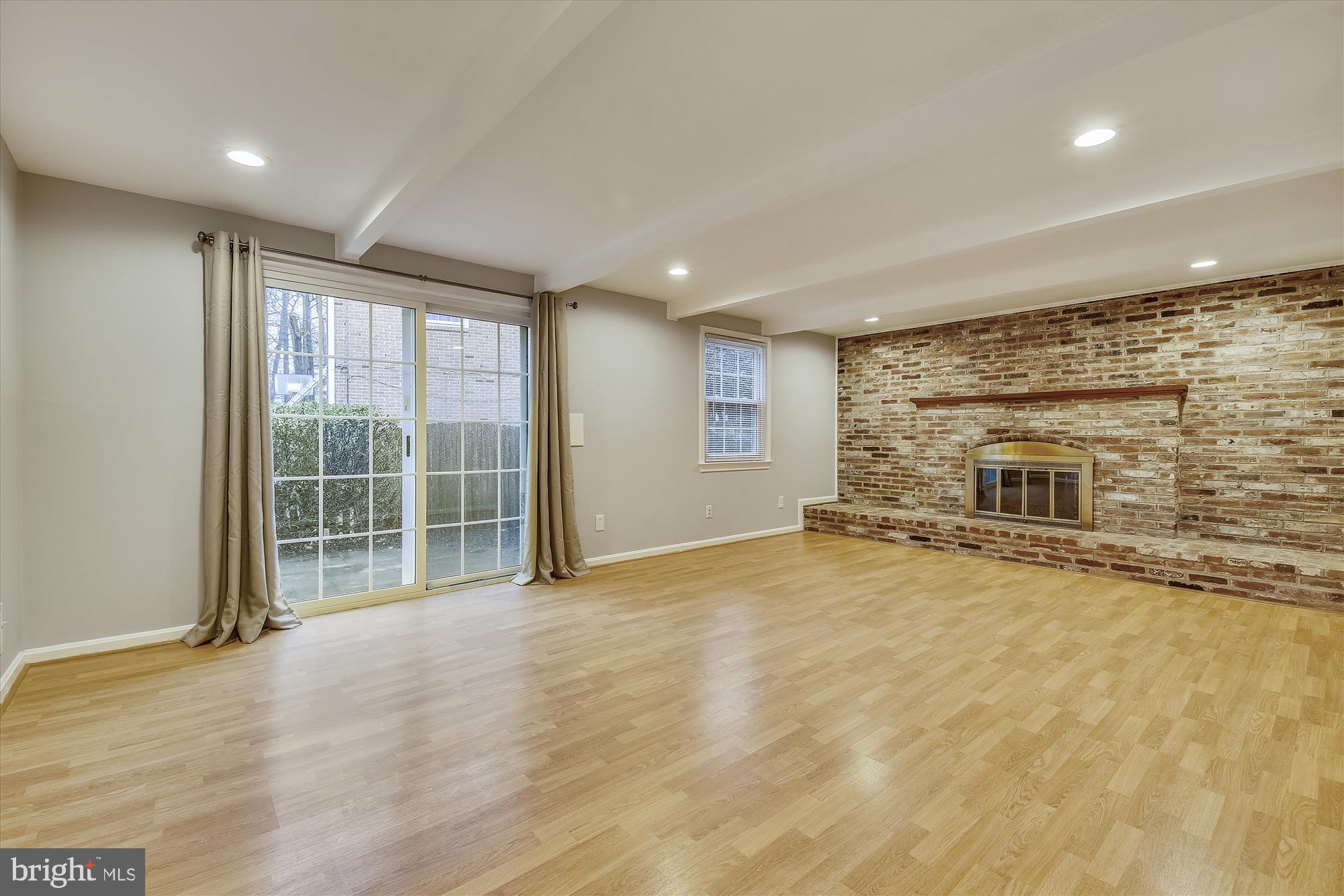 8501 Aqueduct Road Potomac, MD 20854 - Photo 7 of 29 Family room with fireplace