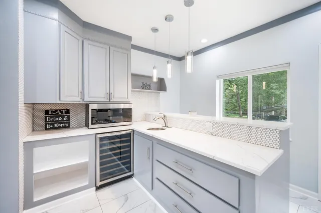 a bedroom with a flat screen television and a bed