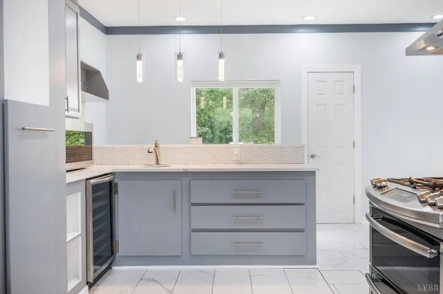 a bedroom with a bed and a table in it