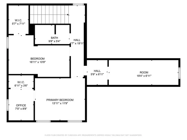 a balcony with furniture and a potted plant
