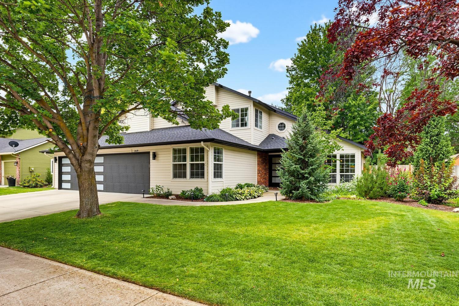 369 South Winthrop Way Boise, ID 83709 - Photo 50 of 50 Contemporary two-story residence with light-colored siding and a dark shingle roof