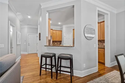 a view of a room that has a table and chair in it