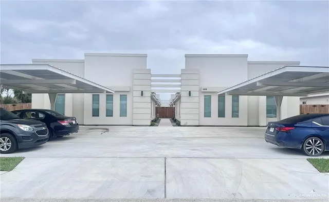 a car parked in front of a house