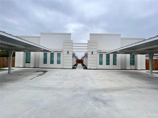 front view of a house with a road