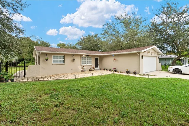 $410,000 | 703 Jefferson Avenue, Lehigh Acres, FL 33936