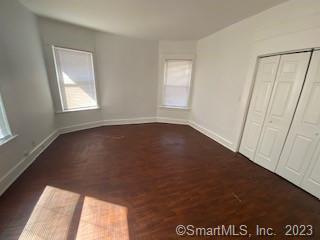 210 Coleman Street, Unit 1 Bridgeport, CT 06604 - Photo 3 of 8 a view of an empty room with a window