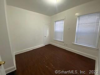210 Coleman Street, Unit 1 Bridgeport, CT 06604 - Photo 4 of 8 an empty room with a window