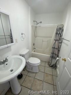210 Coleman Street, Unit 1 Bridgeport, CT 06604 - Photo 8 of 8 a bathroom with a sink toilet and shower