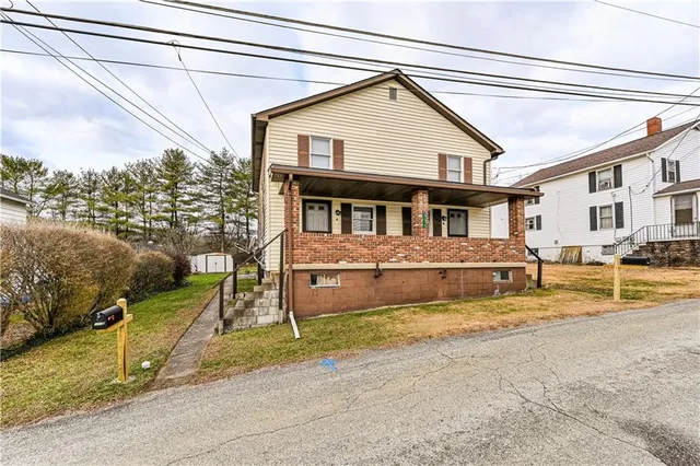 a house view with a outdoor space