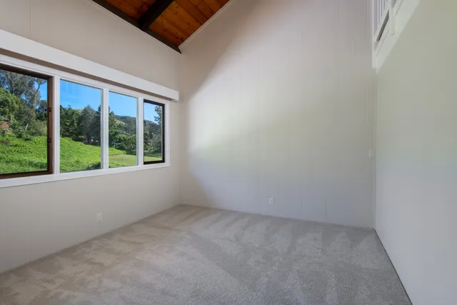 a bathroom with a granite countertop sink mirror and vanity