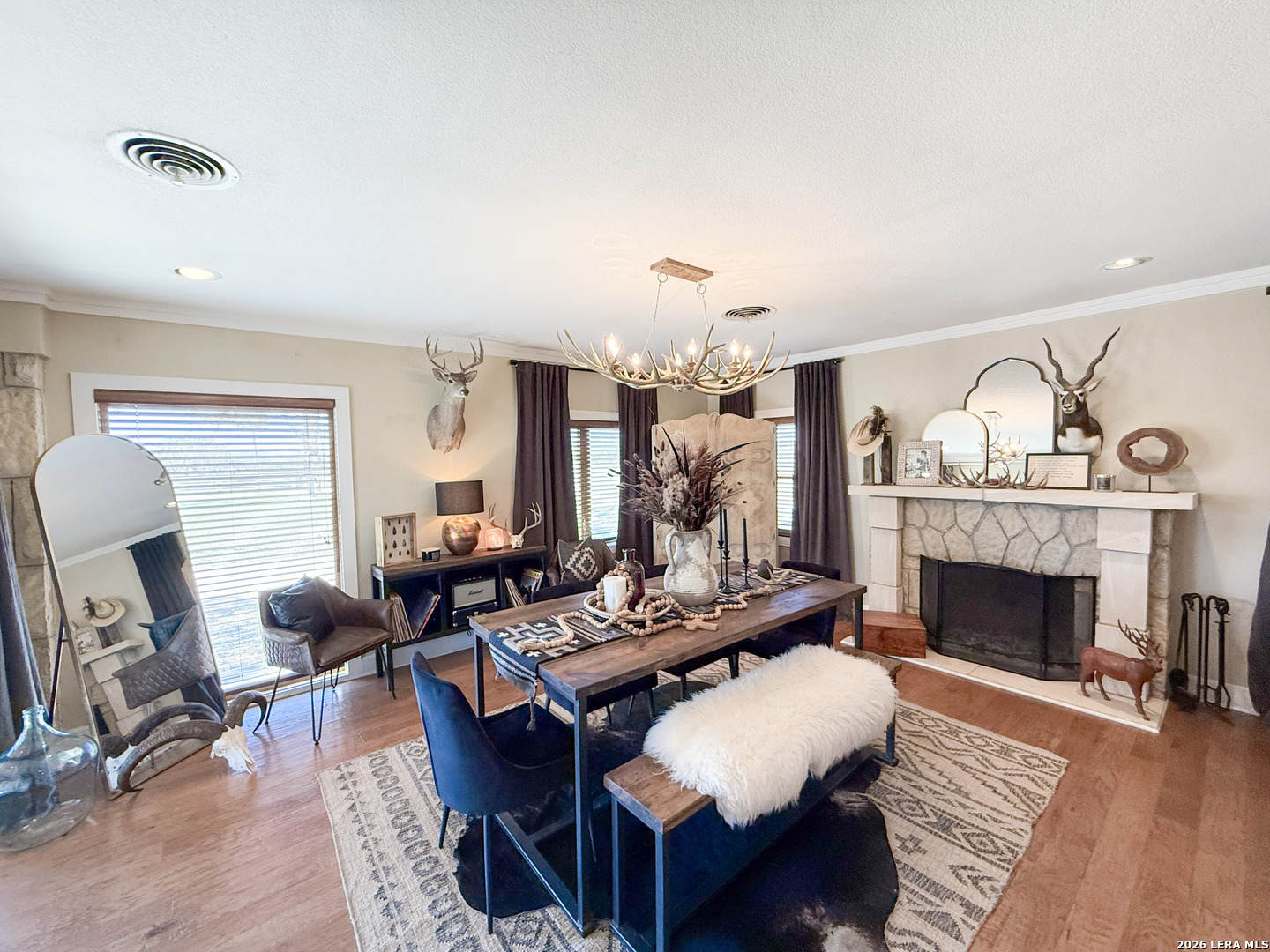 2828 2nd Street Pleasanton, TX 78064 - Photo 16 of 48 a living room with furniture and a fireplace