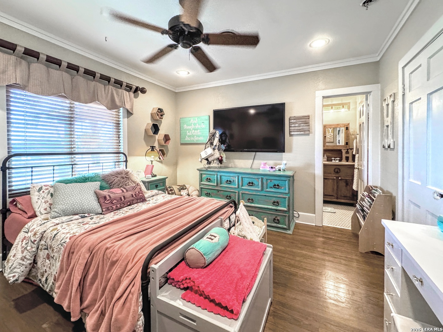 2828 2nd Street Pleasanton, TX 78064 - Photo 22 of 48 a bedroom with a bed and a flat screen tv