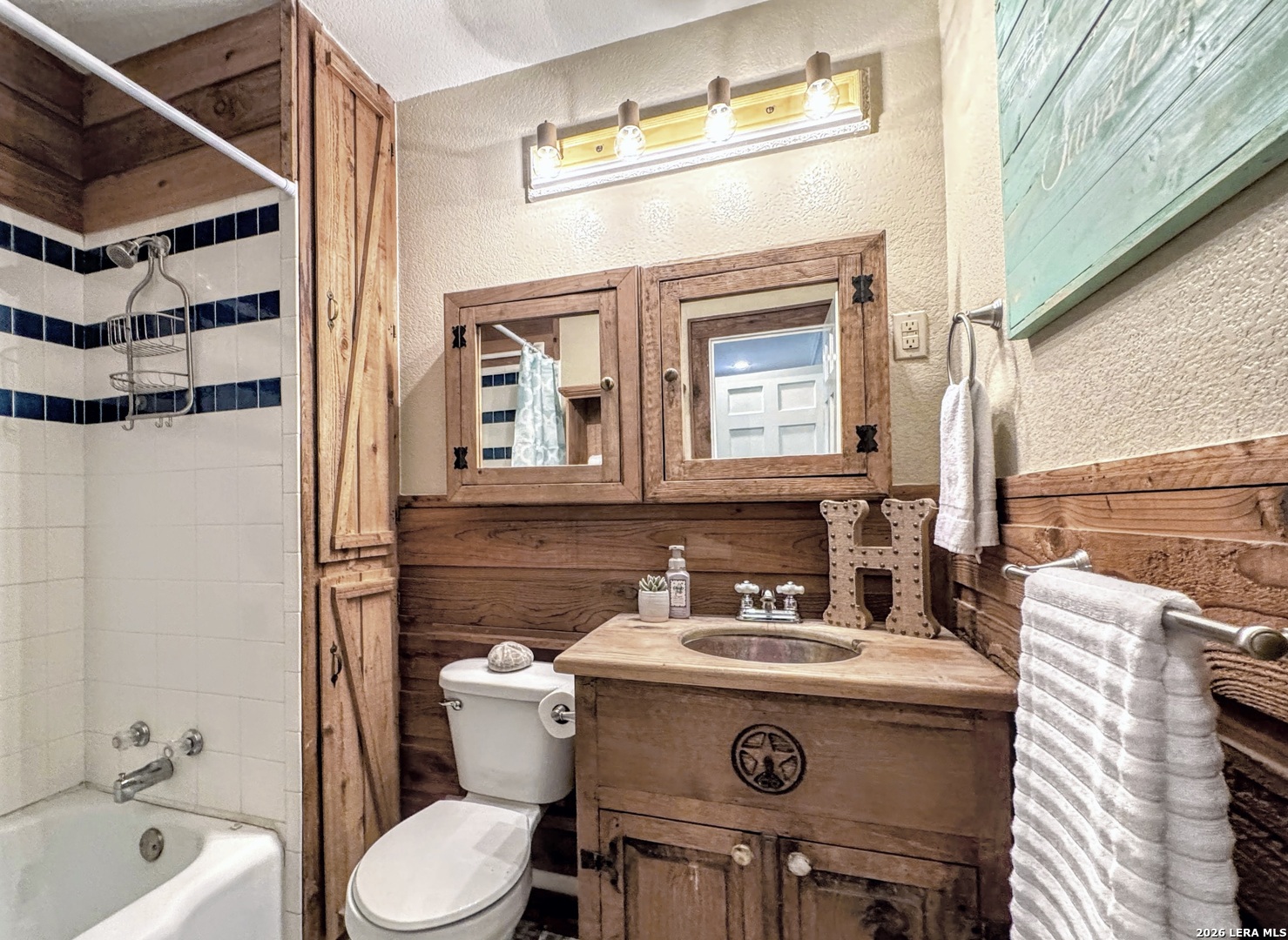 2828 2nd Street Pleasanton, TX 78064 - Photo 23 of 48 a bathroom with a sink and a toilet