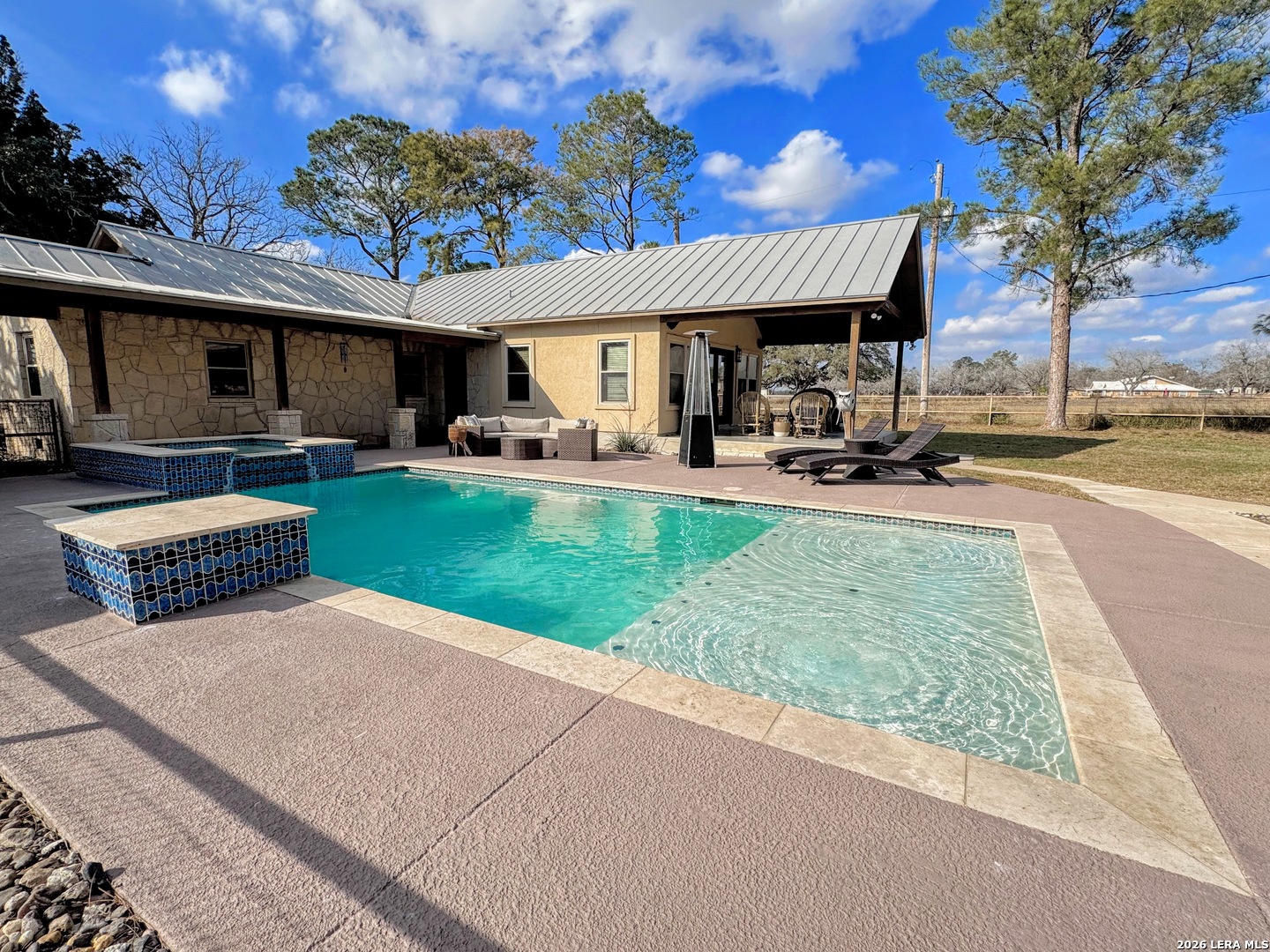 2828 2nd Street Pleasanton, TX 78064 - Photo 31 of 48 a view of a house with backyard porch and sitting area