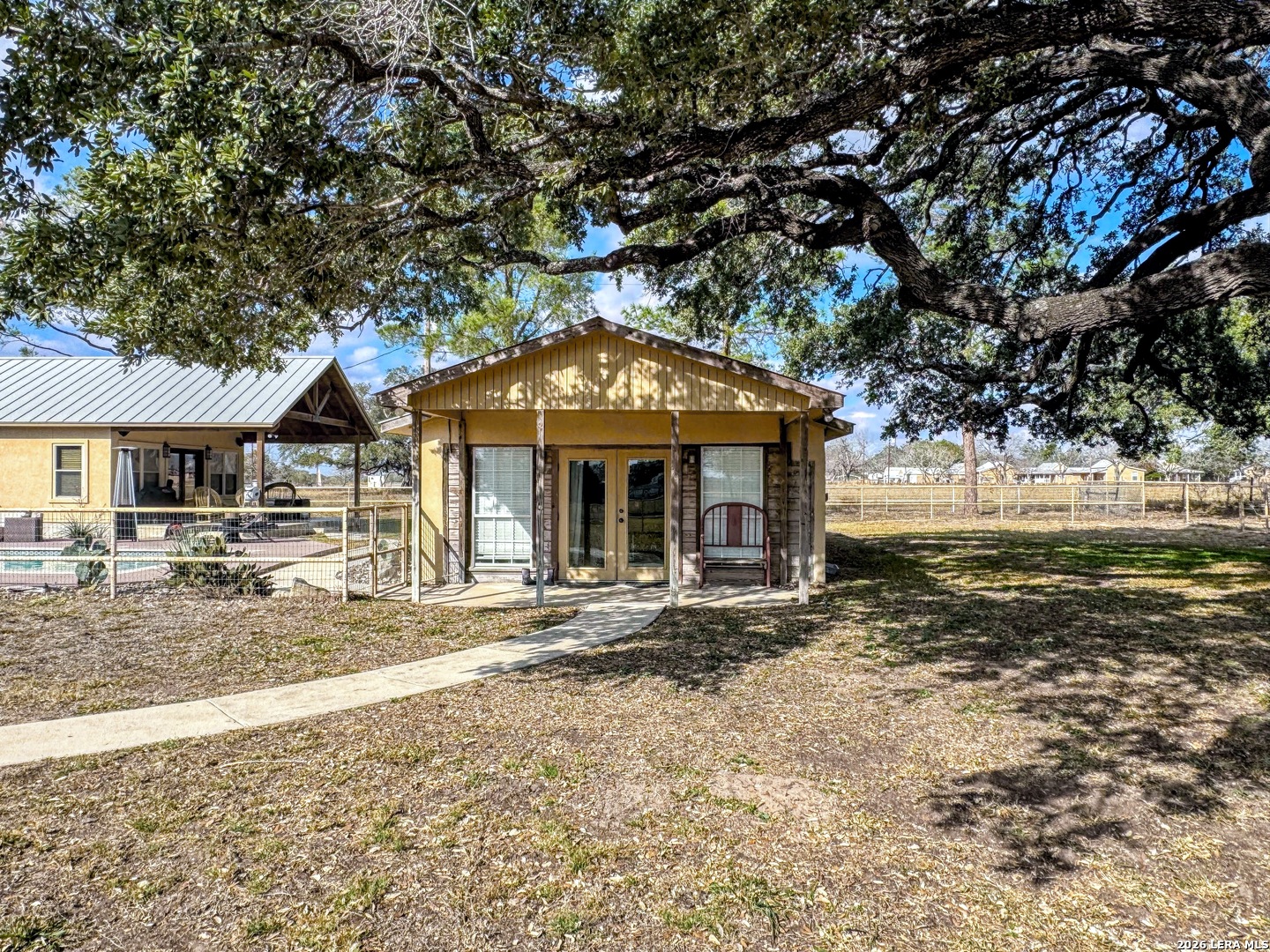 2828 2nd Street Pleasanton, TX 78064 - Photo 35 of 48 a front view of a house with garden