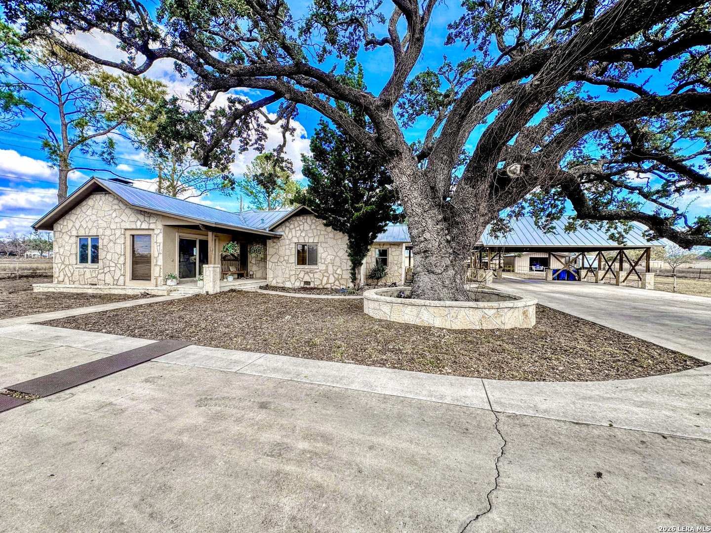 2828 2nd Street Pleasanton, TX 78064 - Photo 4 of 48 a front view of a house with garden