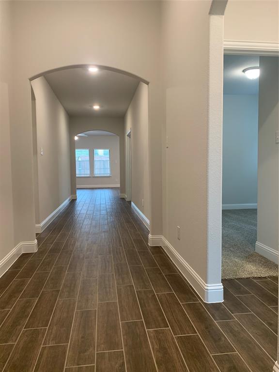 765 Knoxbridge Road Forney, TX 75126 - Photo 11 of 22 a view of a room with wooden floor