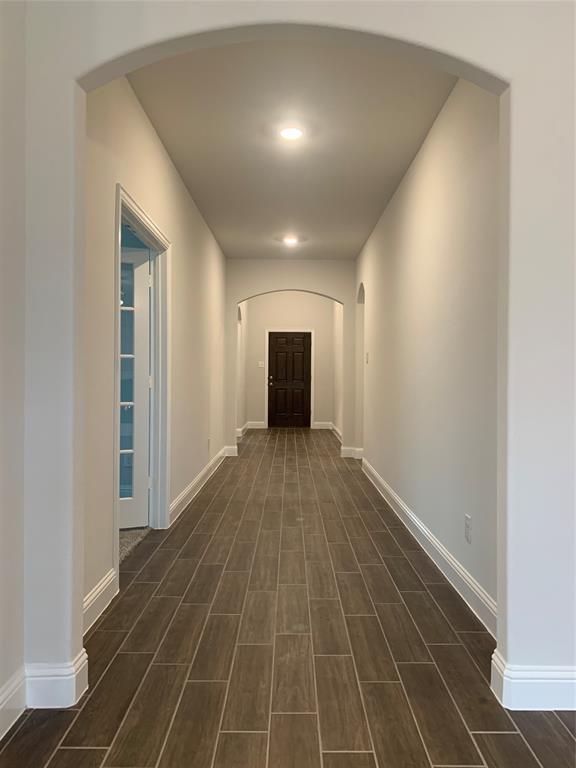 765 Knoxbridge Road Forney, TX 75126 - Photo 12 of 22 a view of empty room with wooden floor