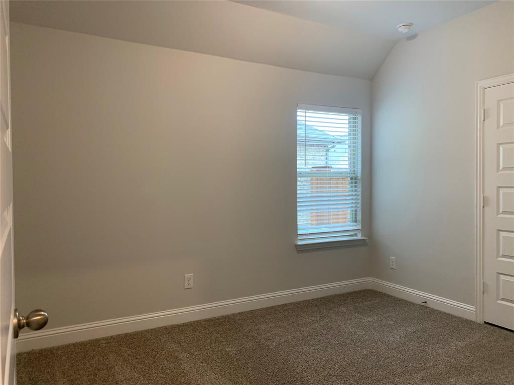 765 Knoxbridge Road Forney, TX 75126 - Photo 17 of 22 an empty room with a window