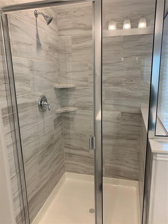 765 Knoxbridge Road Forney, TX 75126 - Photo 18 of 22 a bathroom with a shower