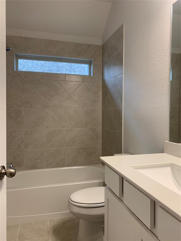 765 Knoxbridge Road Forney, TX 75126 - Photo 19 of 22 a bathroom with a sink a toilet and shower