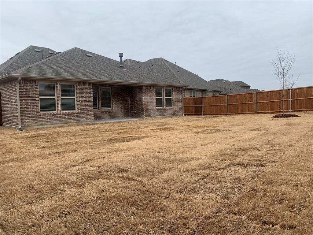 765 Knoxbridge Road Forney, TX 75126 - Photo 21 of 22 a house with yard in front of it