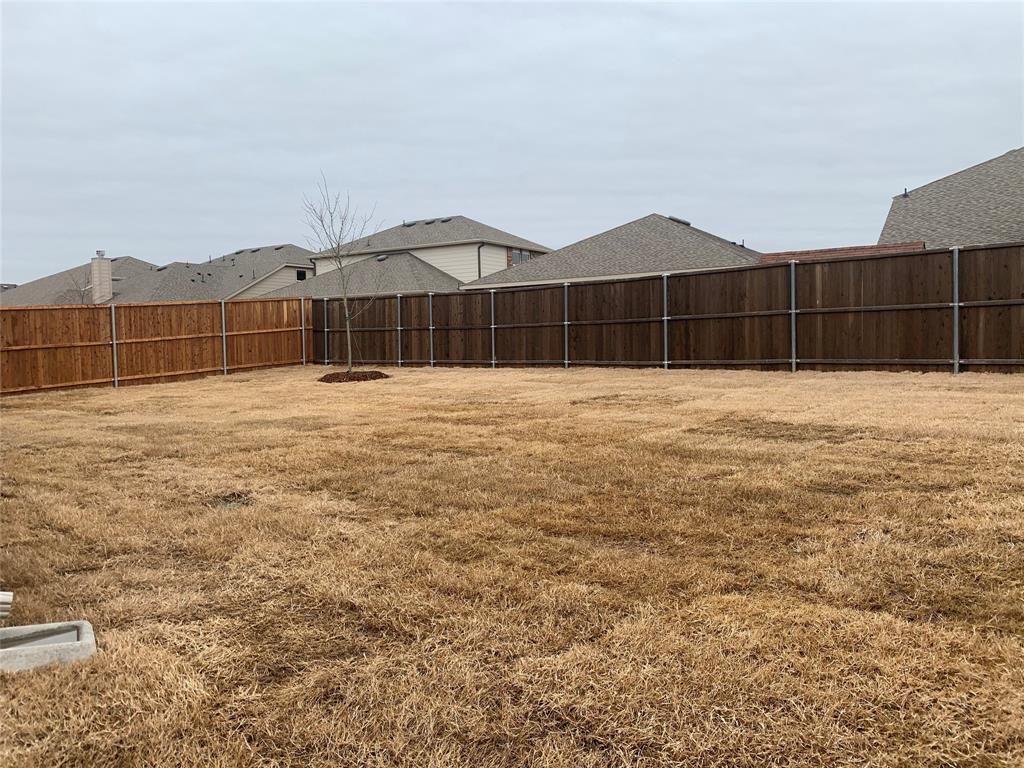 765 Knoxbridge Road Forney, TX 75126 - Photo 22 of 22 a view of an empty room with wooden fence