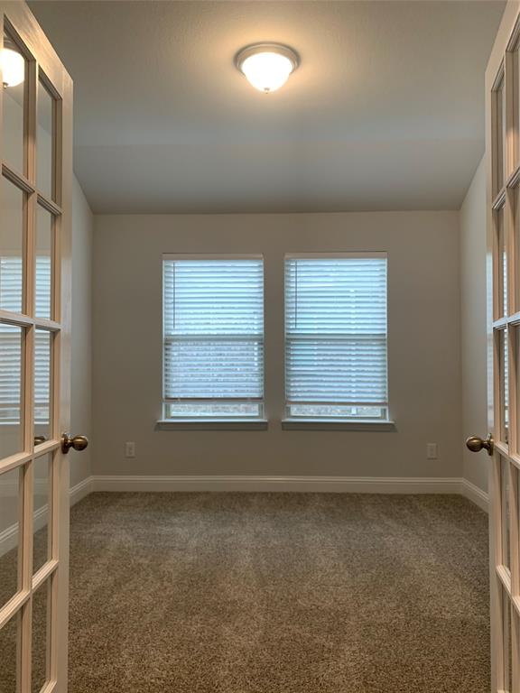 765 Knoxbridge Road Forney, TX 75126 - Photo 10 of 22 an empty room with a windows