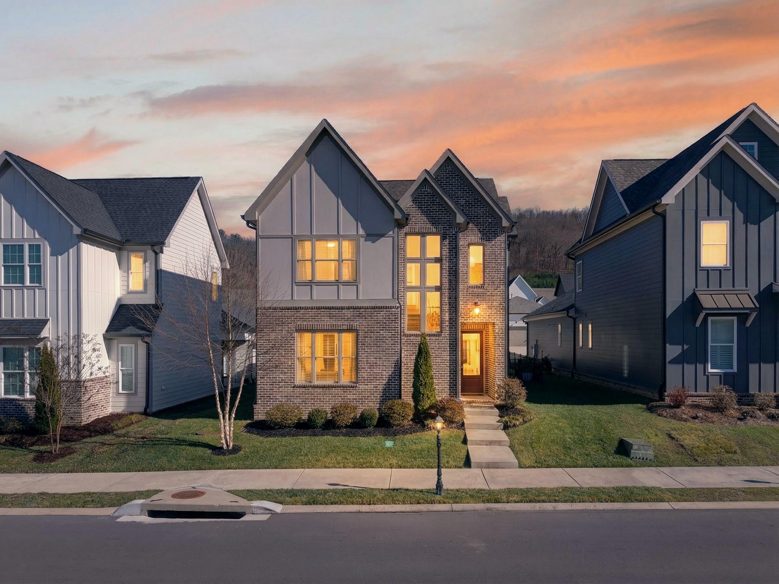 4162 Barnsley Loop Ooltewah, TN 37363 - Photo 2 of 40 DJI_20260211150231_0720_Dtwilight 2