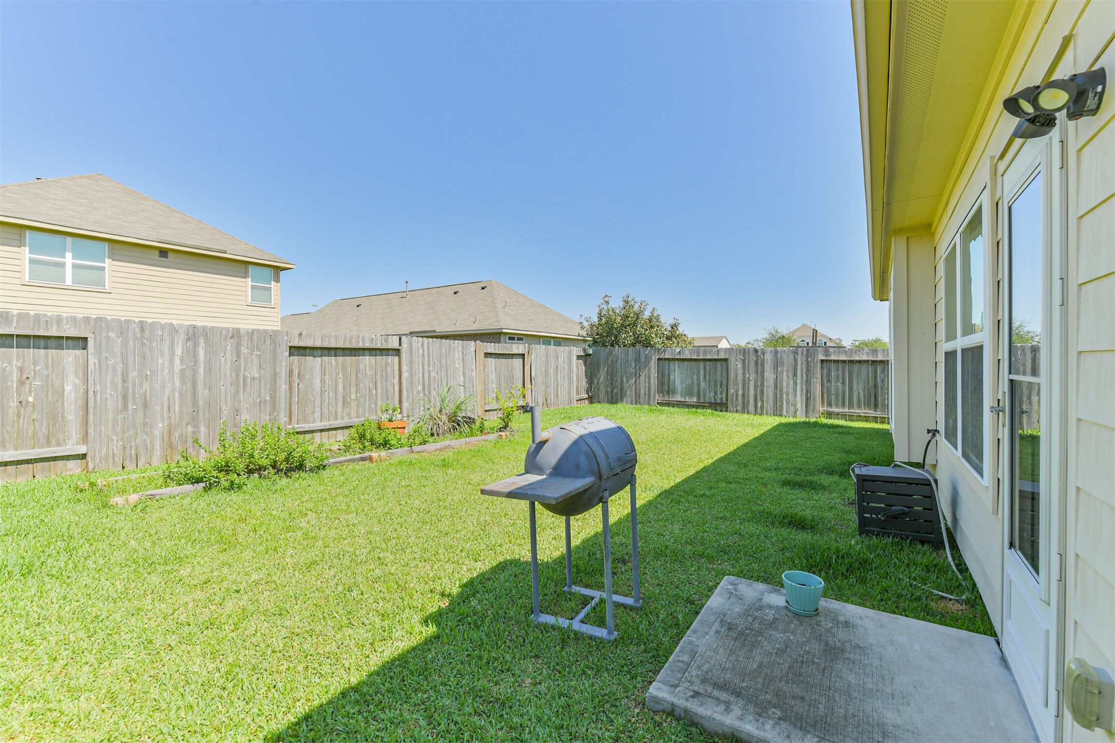 7527 Windsor Valley Lane Houston, TX 77049 - Photo 33 of 35 a swimming pool with outdoor seating and garden