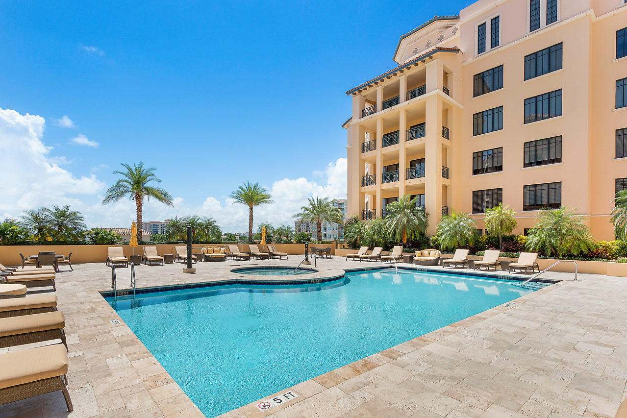 200 East Palmetto Park Road, Unit 410 Boca Raton, FL 33432 - Photo 36 of 44 a view of a swimming pool with outdoor seating