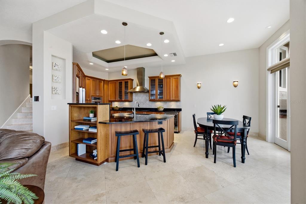 761 Norton Street Longboat Key, FL 34228 - Photo 17 of 66 a view of a dining room with furniture