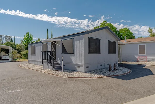 a house view with a garden space