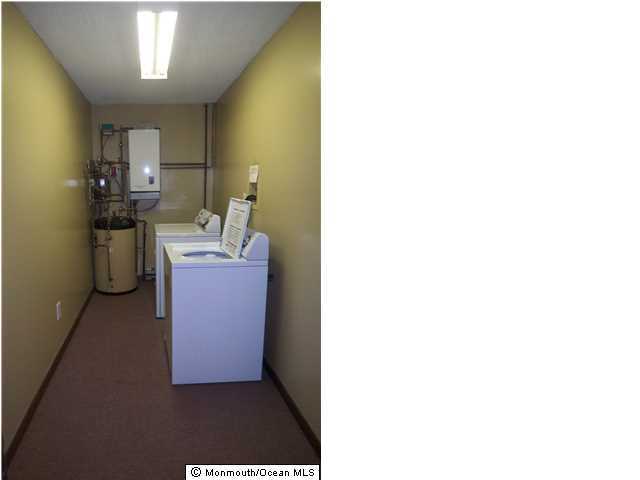 1204 River Road, Unit 1/2 B Belmar, NJ 07719 - Photo 11 of 19 a en suite bathroom with a sink and a mirror