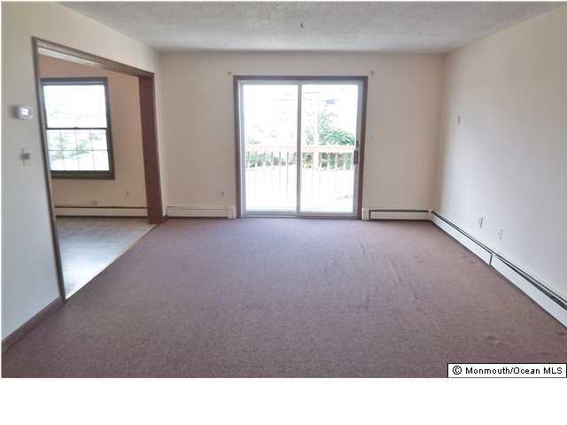 1204 River Road, Unit 1/2 B Belmar, NJ 07719 - Photo 8 of 19 a black and white photo of a living room